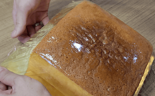 cling wrap the cake