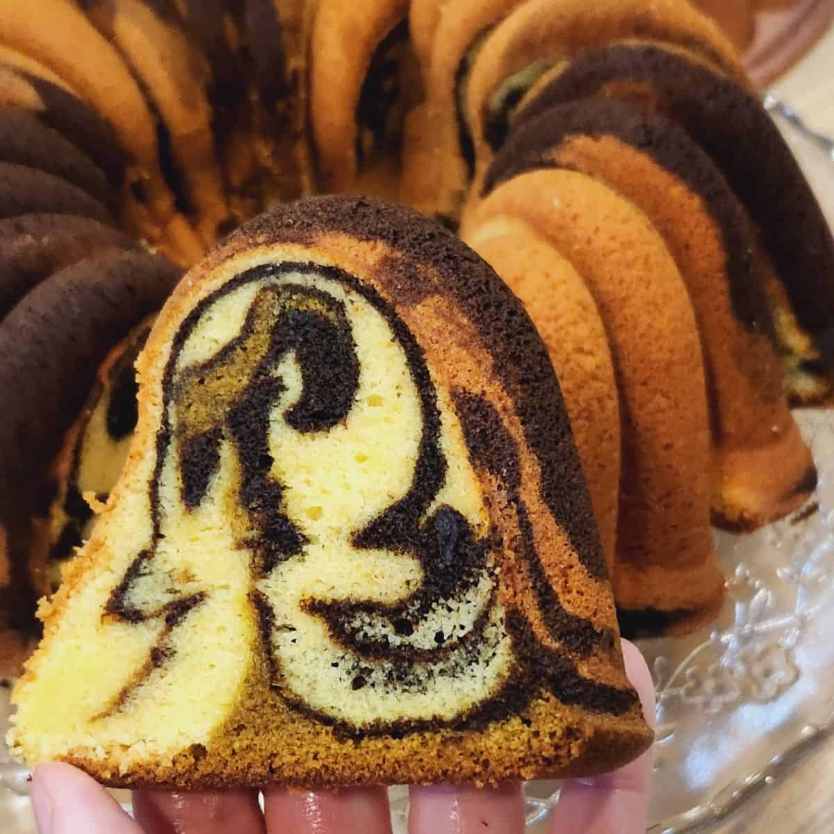A slice of marble cake with beautiful pattern.