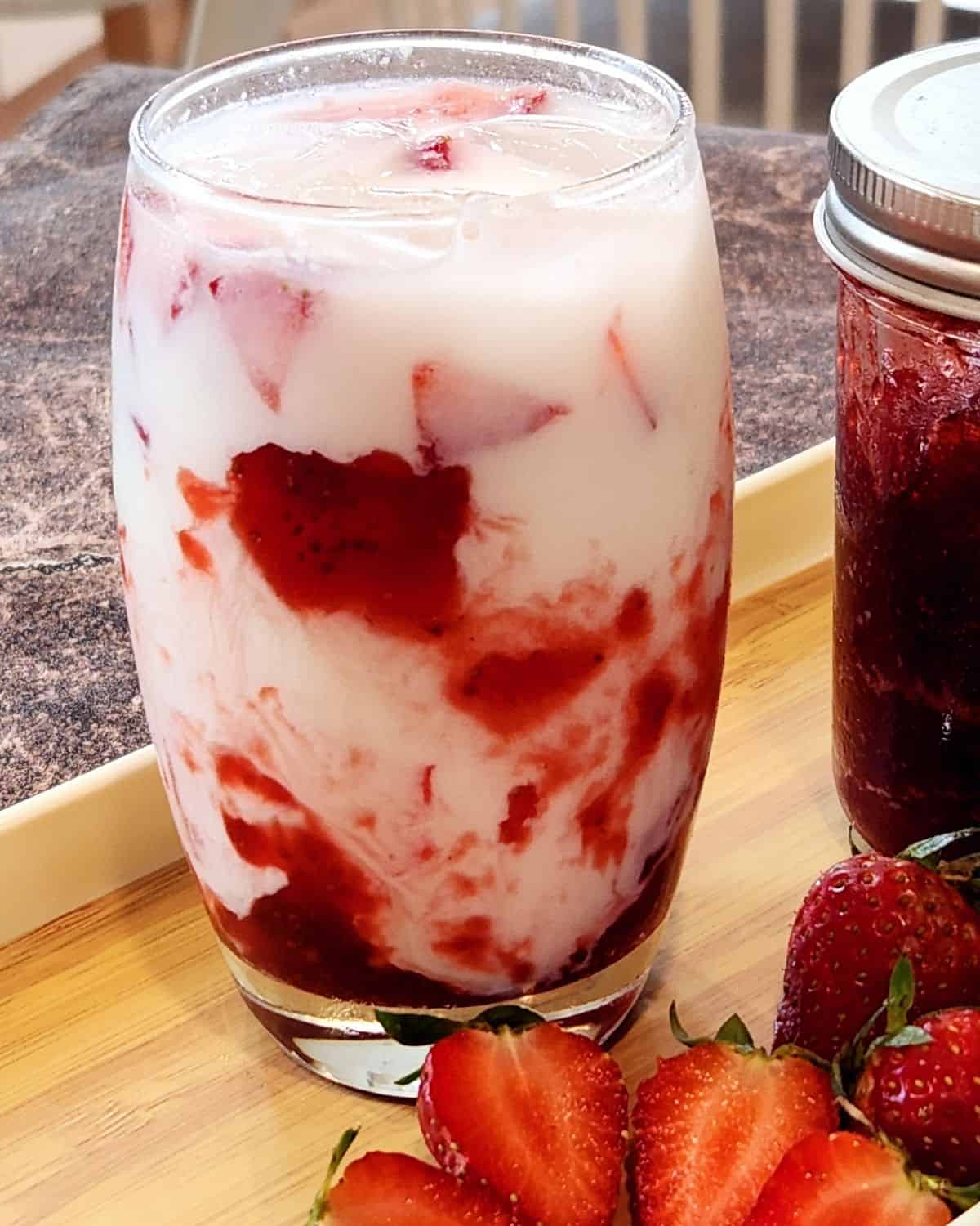 A glass of Korean strawberry milk.