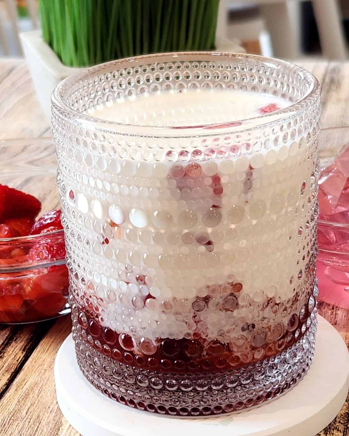 A glass of Korean strawberry milk. 