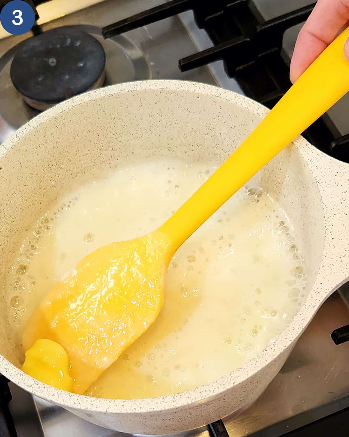 A photo of butter put into the sauce pan.