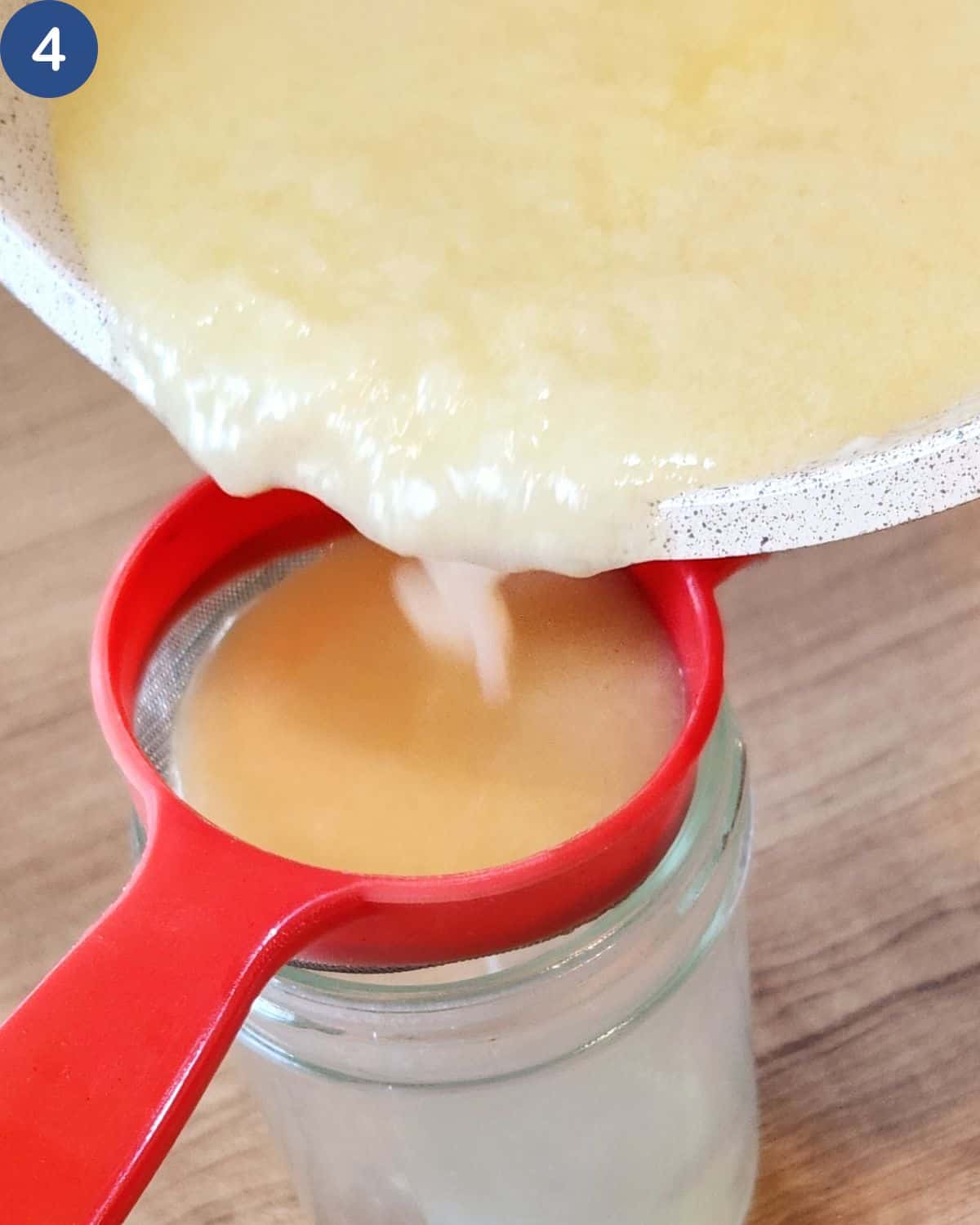 A photo of the milk strained through to make it smooth.