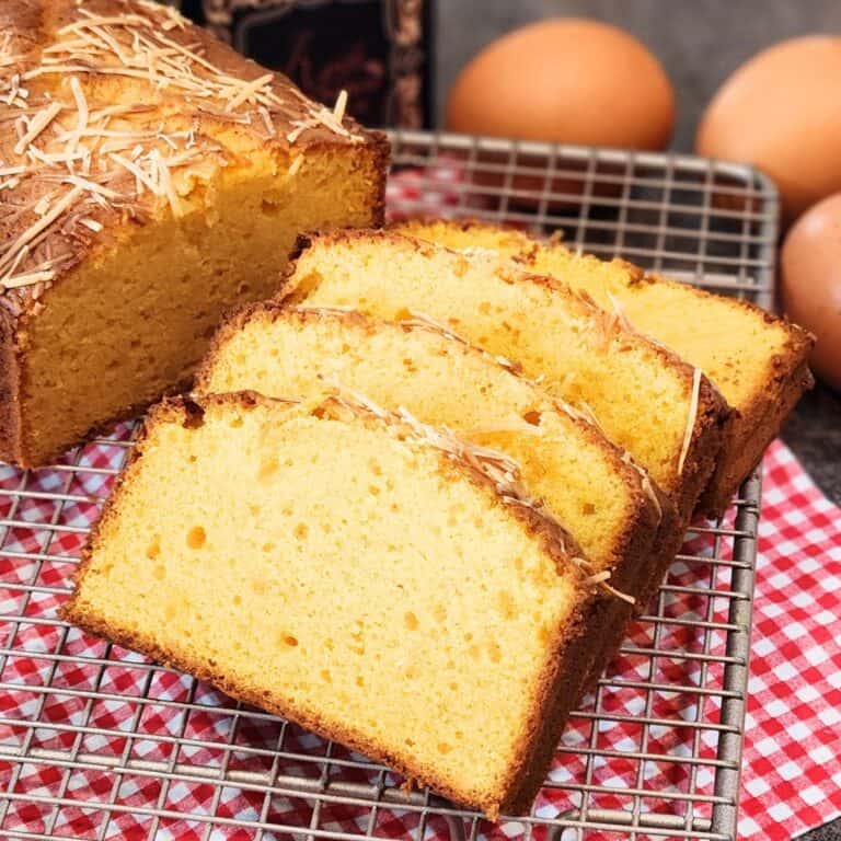 Fermentec Cassava Cake or Bolu Tape slices on a cooling rack.