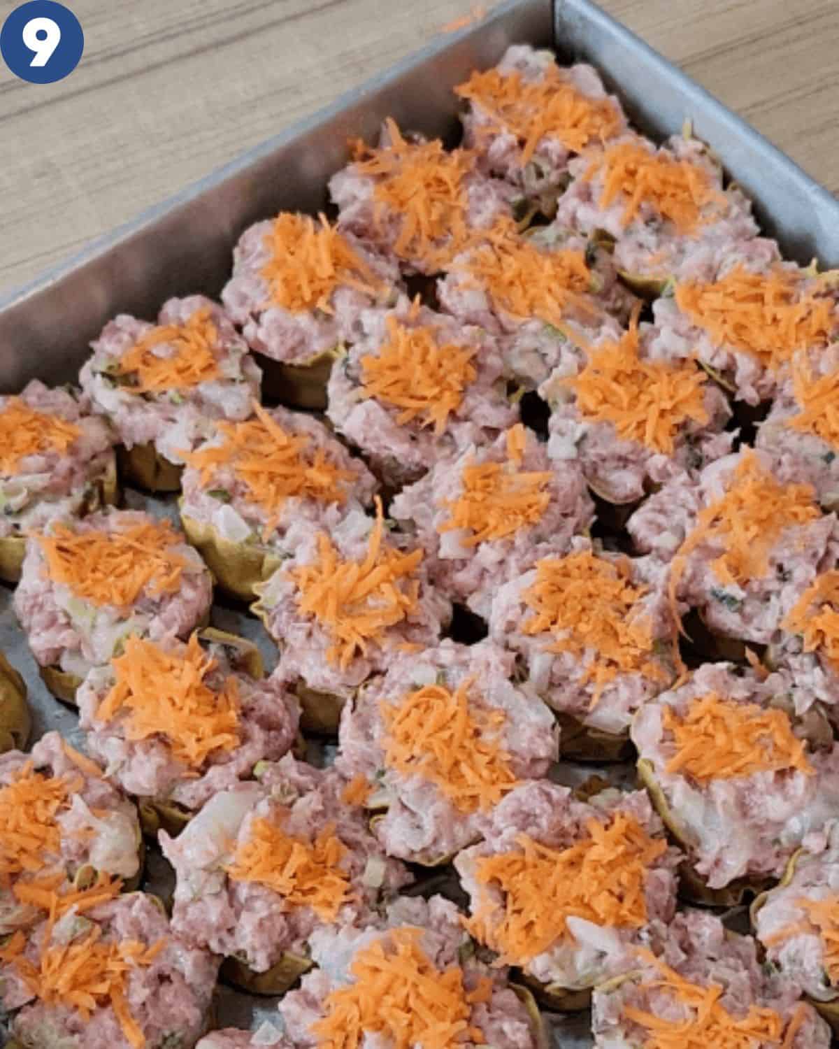 A tray of shu mai ready to be steamed.