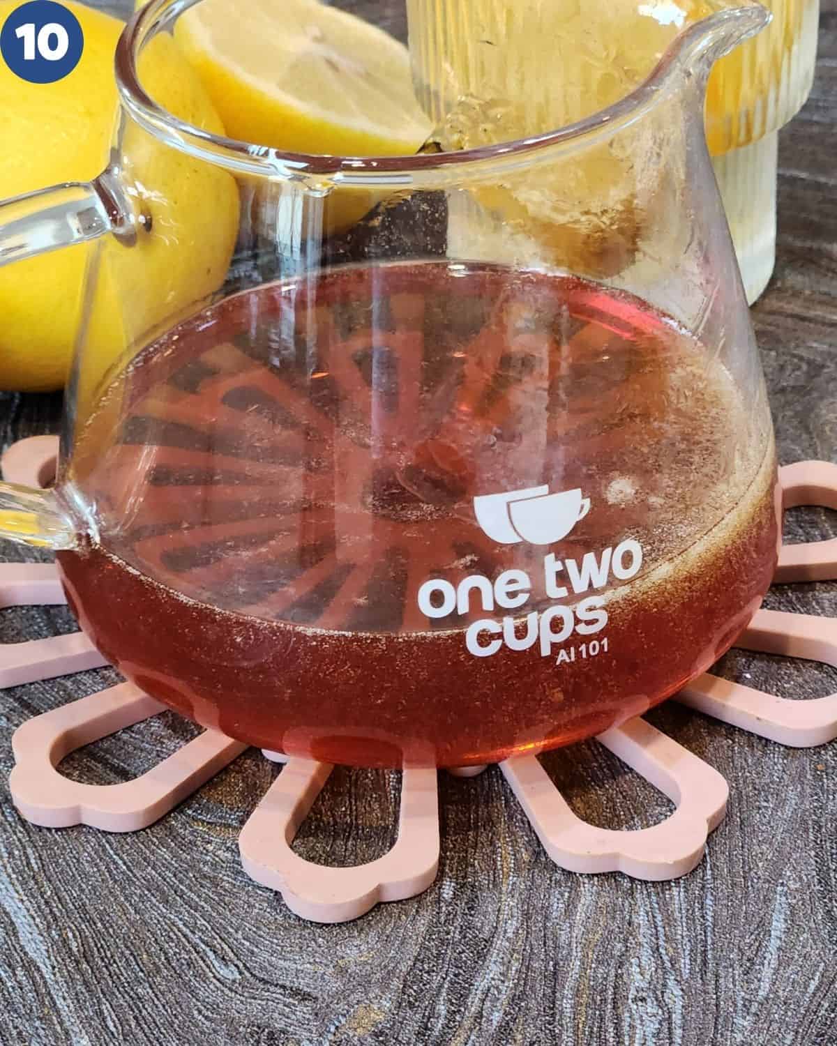 The bubble in the syrup subsides, leaving clear golden syrup.