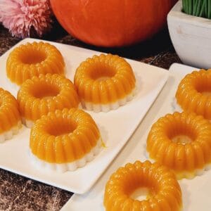 Two plates of kuih talam labu, beautifully aligned.