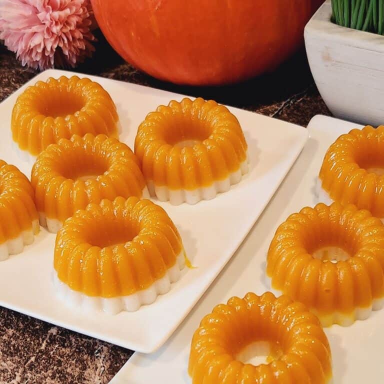 Two plates of kuih talam labu, beautifully aligned.