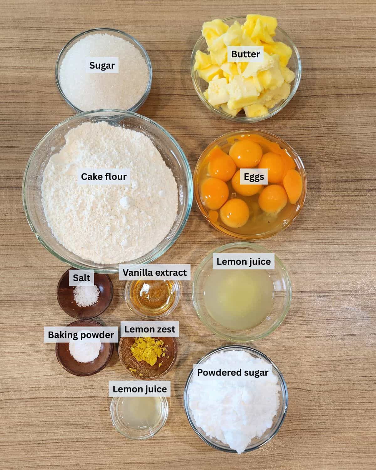 Lemon butter cake ingredients with labels.