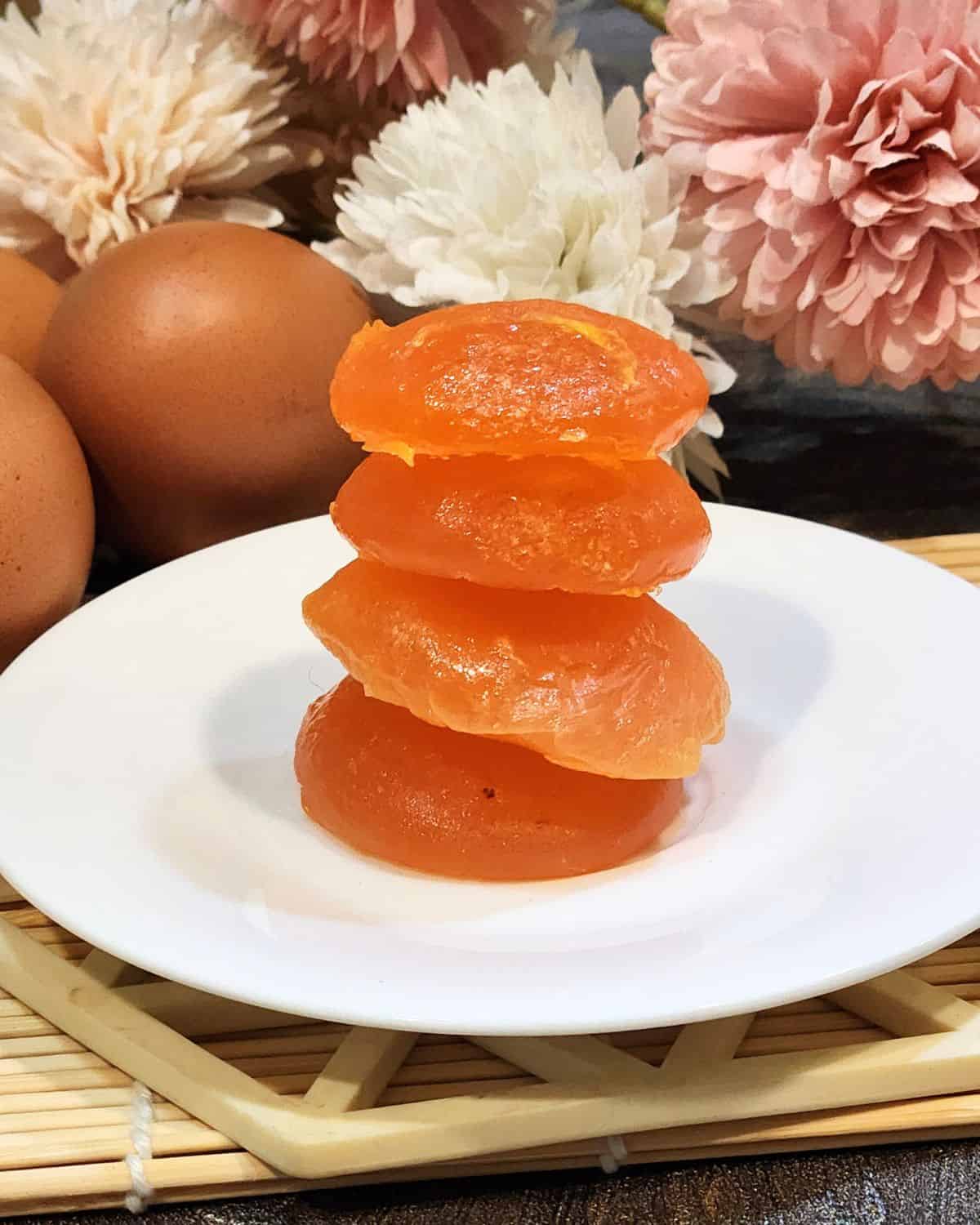 A stack of salted cured egg yolks ready to be grated for pasta toppings.