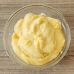 A bowl of creamy custard filling.