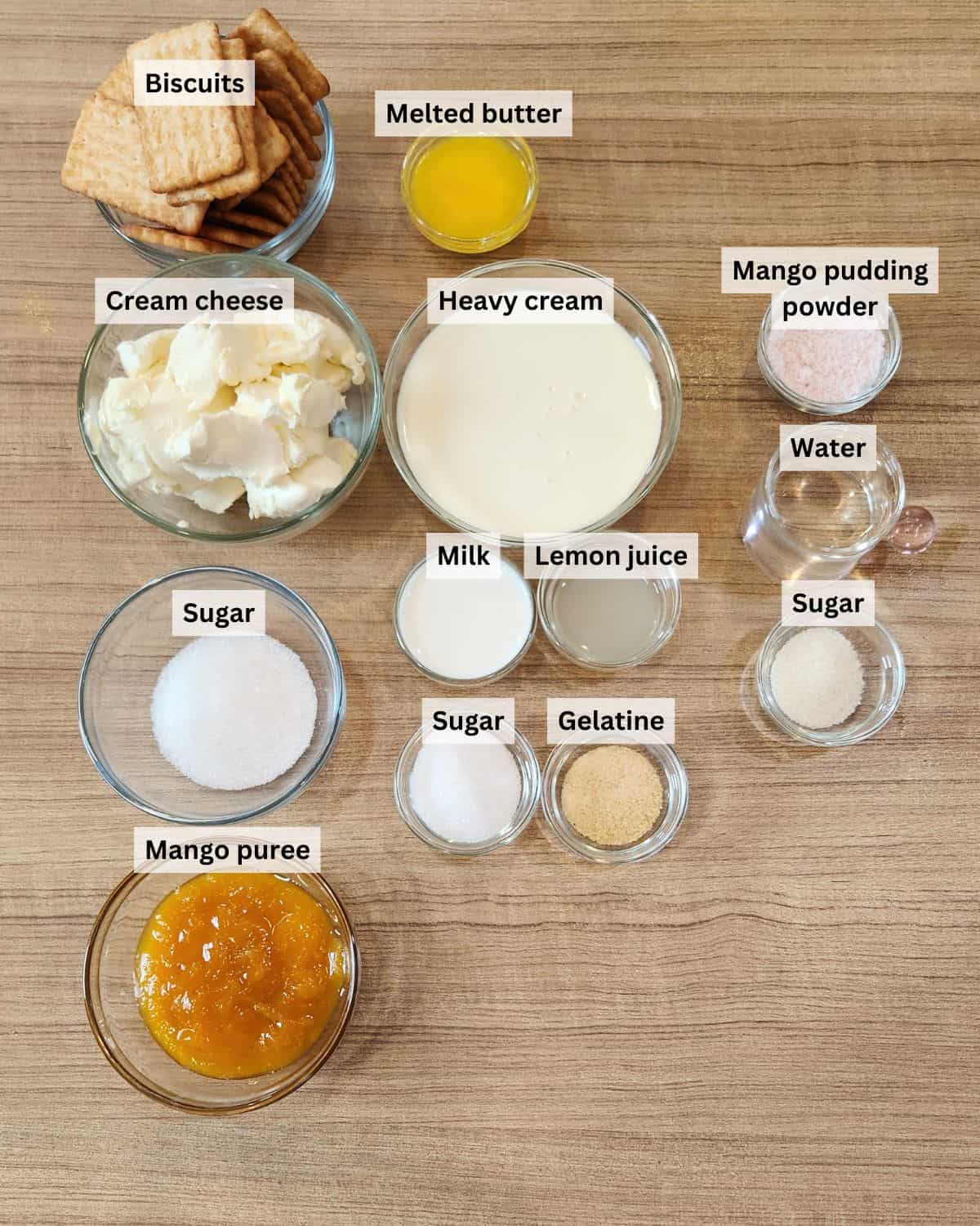 No bake mango cheesecake ingredients with labels.