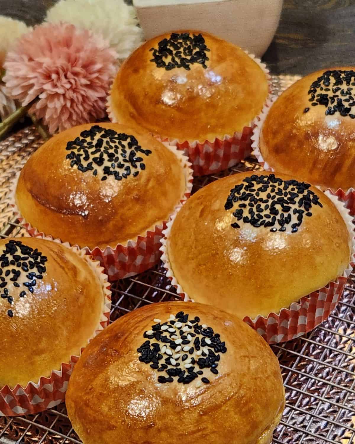 Japanese Red Bean Bread on a wire rack.