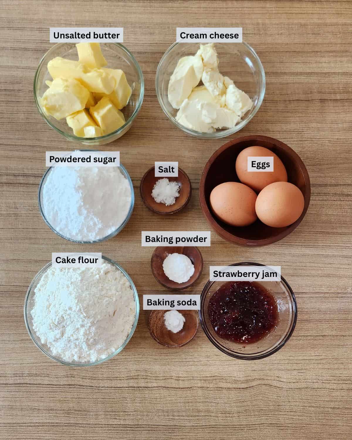 Strawberry cream cheese pound cake ingredients with labels.