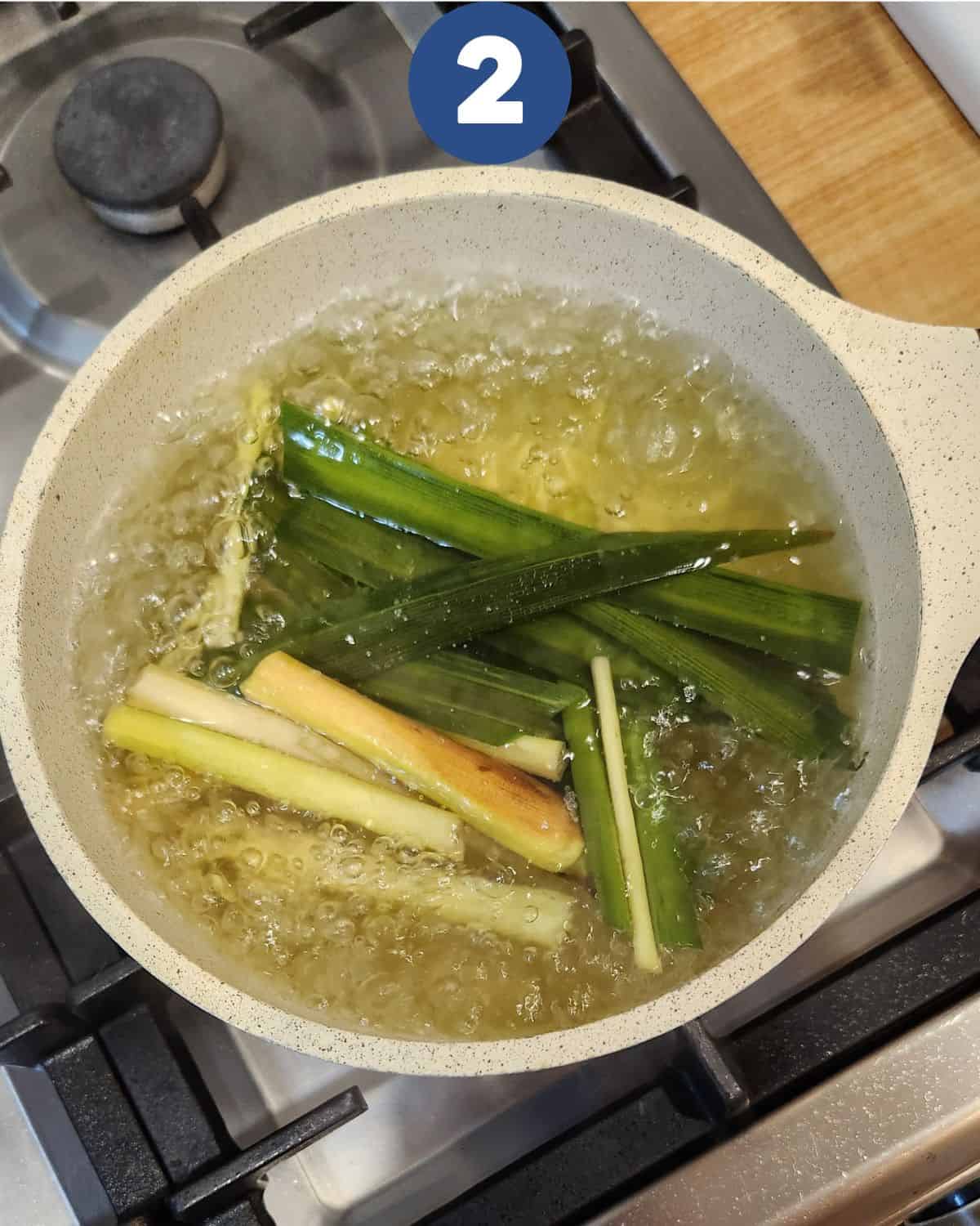 Step by step process of brewing lemongrass and pandan leaves in a pot.