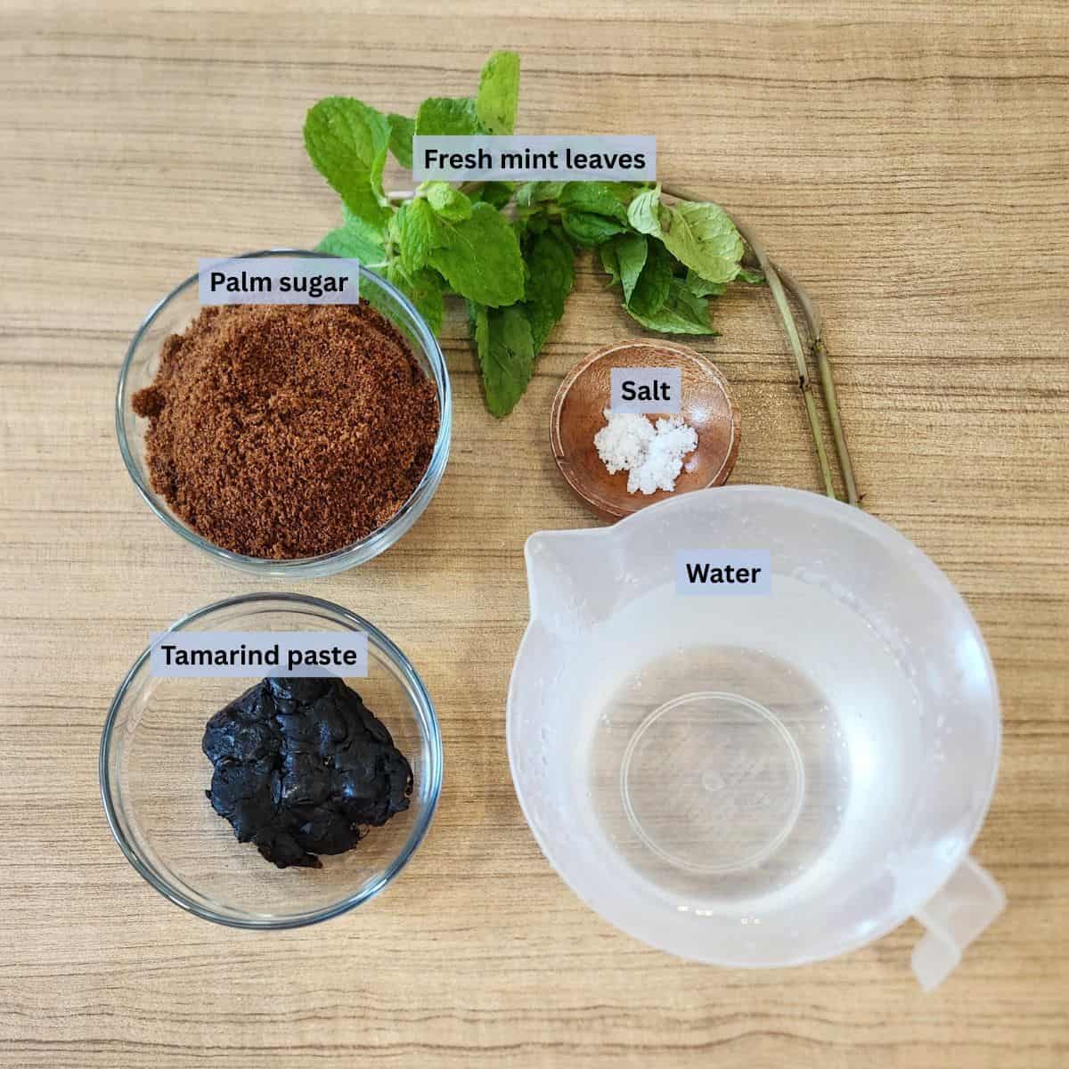 Tamarind tea ingredients with labels.