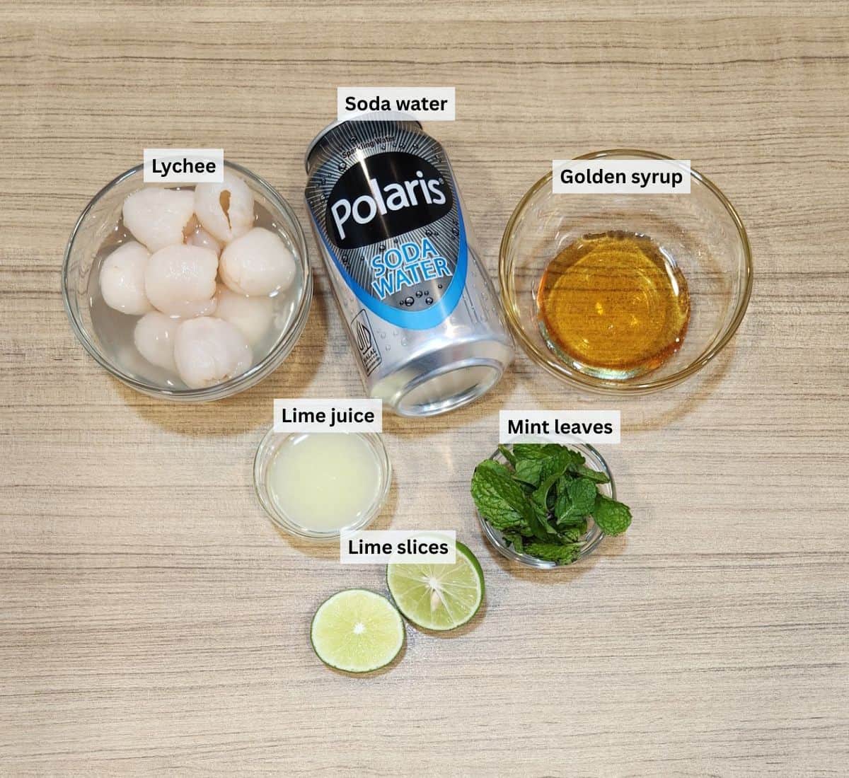 Lychee soda ingredients with labels.