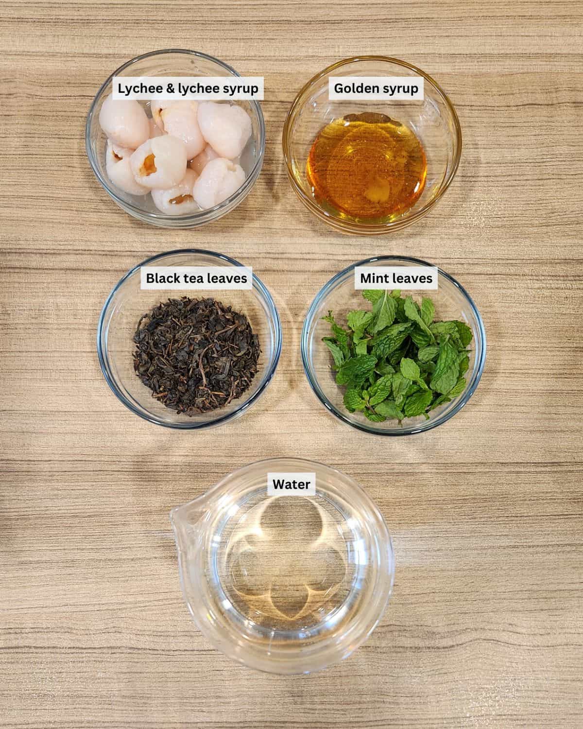 Lychee tea ingredients with labels.