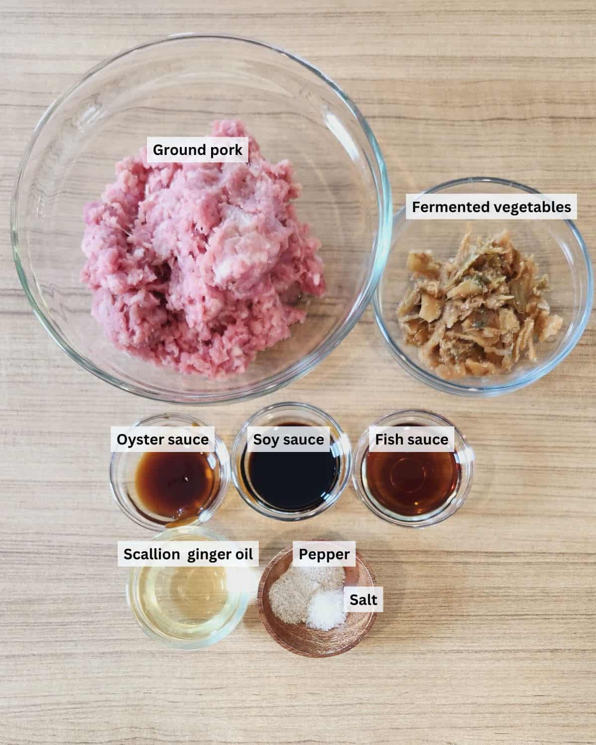 Steamed pork patty ingredients with labels.