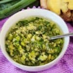 A bowl full of ginger scallion sauce.