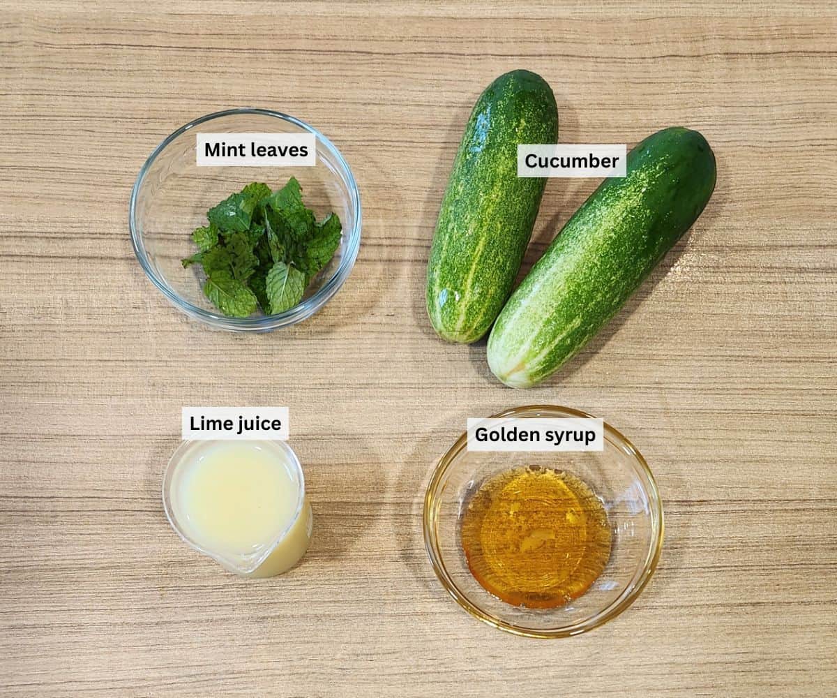 A picture of cucumber juice drink recipe ingredients with labels.