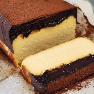 A slice of iceberg cheesecake freshly cut.