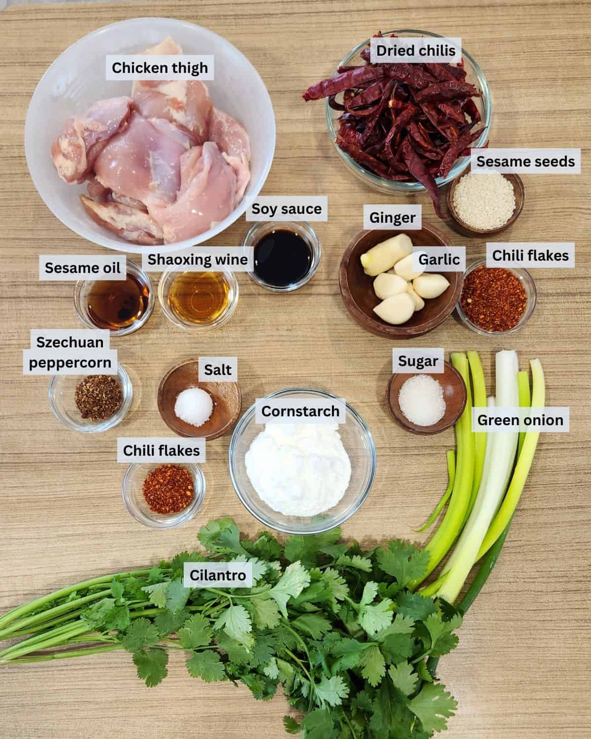 Szechuan chicken ingredients with labels.