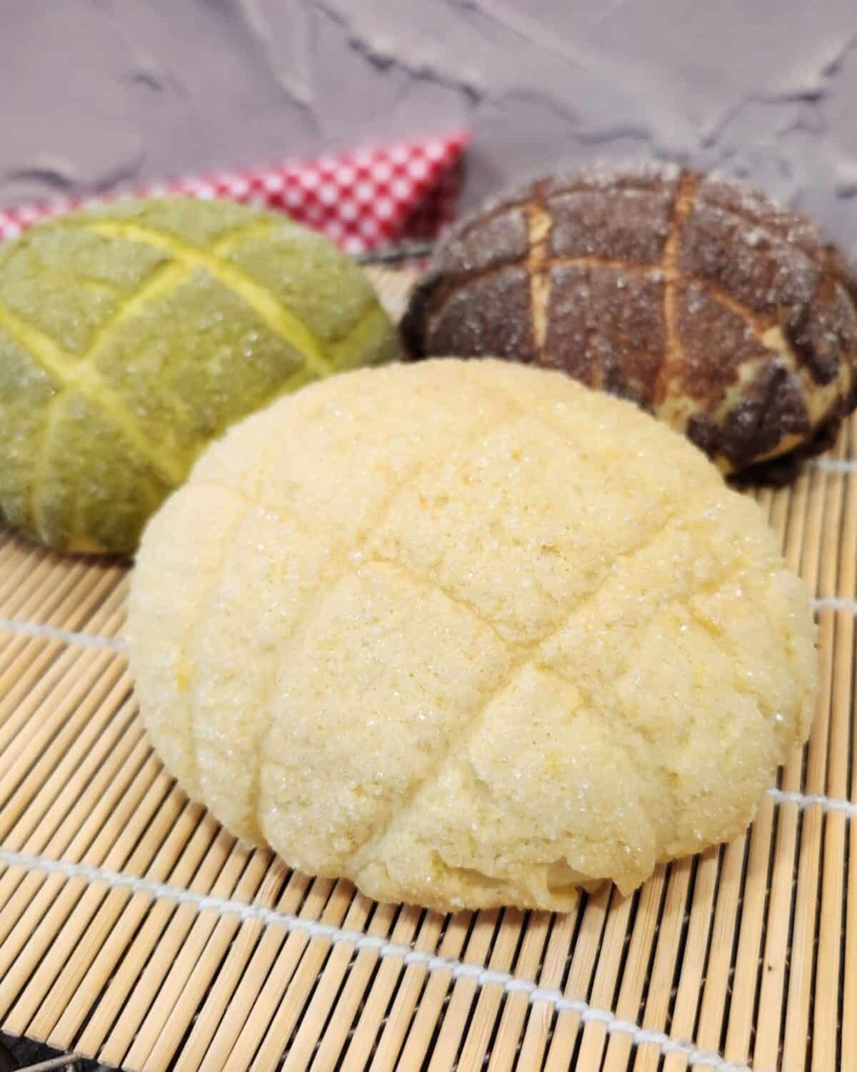 Three Melon Pan bread with original, matcha, and chocolate flavor.