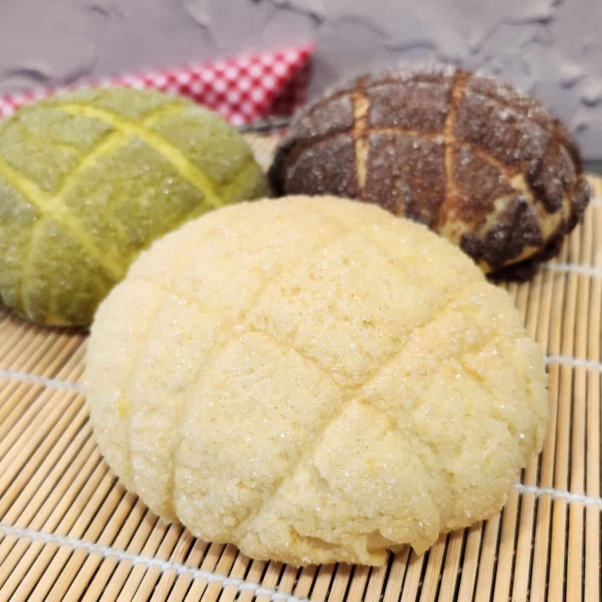 Three Melon Pan bread with original, matcha, and chocolate flavor.