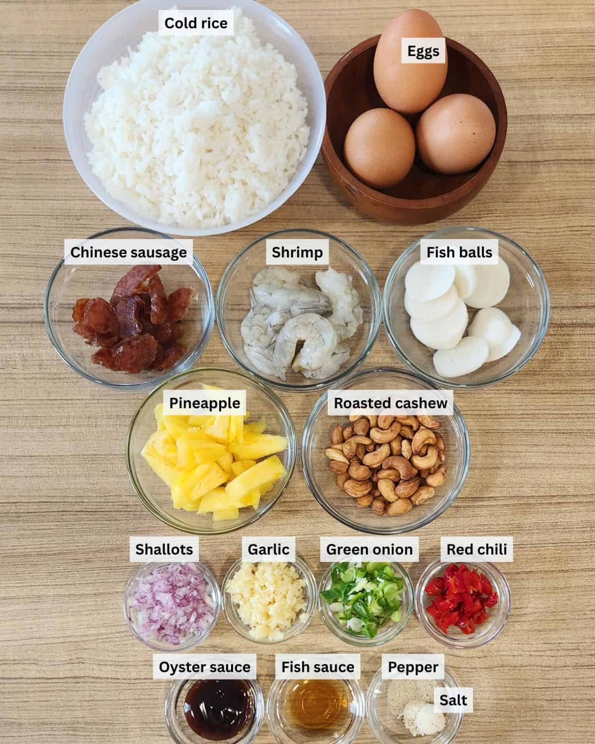 Pineapple shrimp fried rice ingredients with labels.