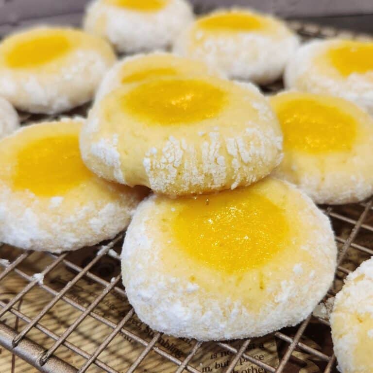 Lemon curd cookies on cooling rack.