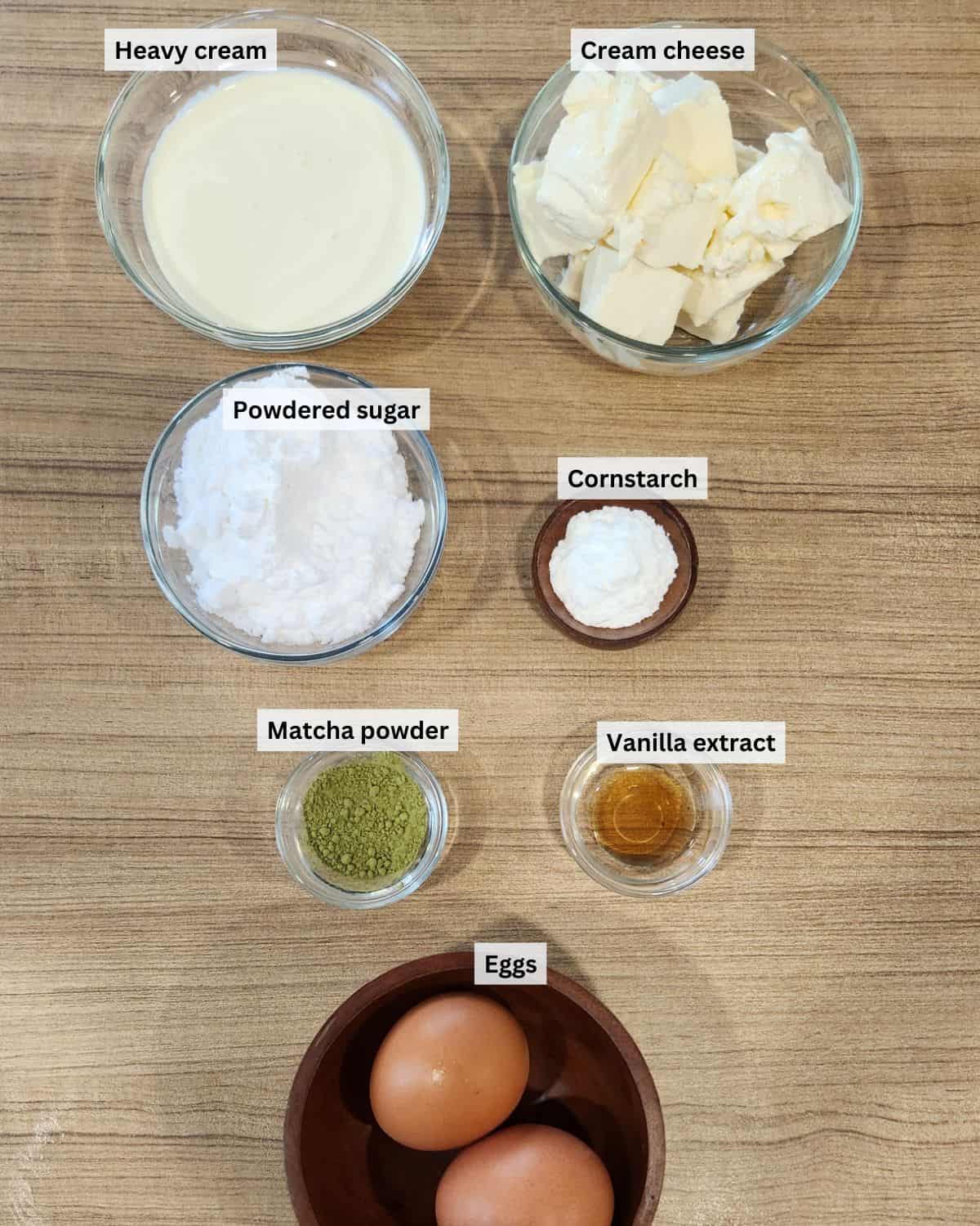 Matcha cheesecake ingredients with labels.