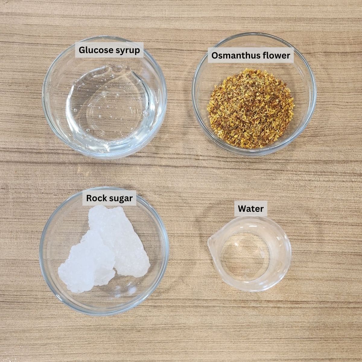 Osmanthus syrup ingredients with labels.