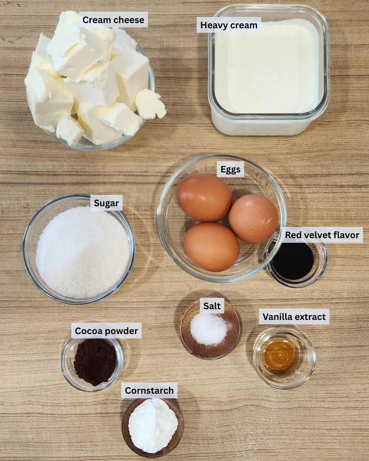 Red velvet cheesecake ingredients with labels.